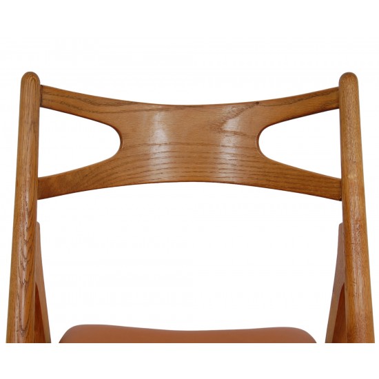 Set of 6 Hans Wegner Sawbuck dining chairs in oak and cognac anilin leather