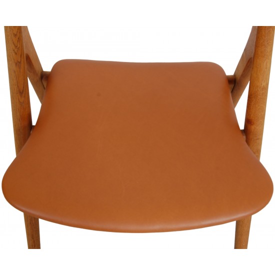 Set of 6 Hans Wegner Sawbuck dining chairs in oak and cognac anilin leather