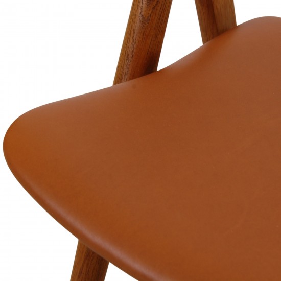 Set of 6 Hans Wegner Sawbuck dining chairs in oak and cognac anilin leather