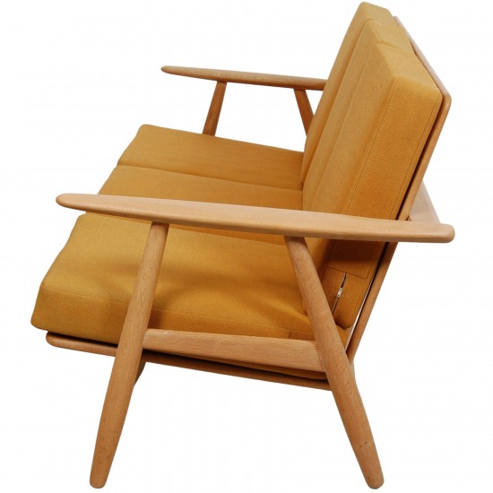 Hans Wegner 3.seater Cigar sofa of oak and yellow fabric