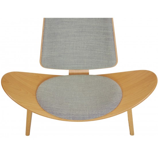 Hans Wegner Shell chair in oiled oak and grey fabric