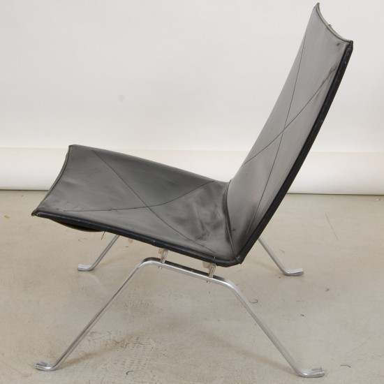 Poul Kjærholm PK-22 lounge chair in patinated black leather