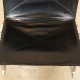 Poul Kjærholm PK-22 lounge chair in patinated black leather