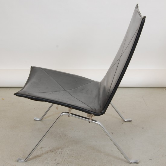 Poul Kjærholm PK-22 lounge chair in patinated black leather