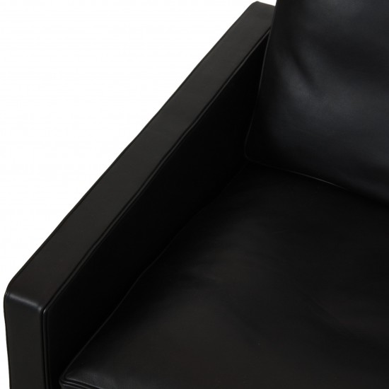 Poul Kjærholm PK-31 lounge chair reupholstered in black aniline leather