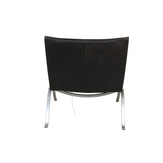 Poul Kjærholm PK-22 lounge chair in patinated black leather