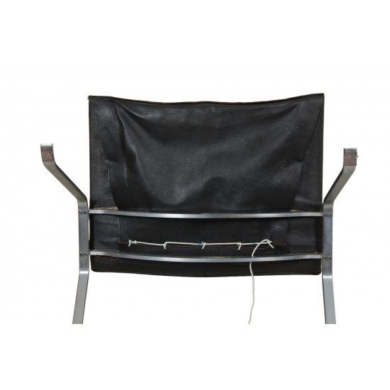 Poul Kjærholm PK-22 lounge chair in patinated black leather