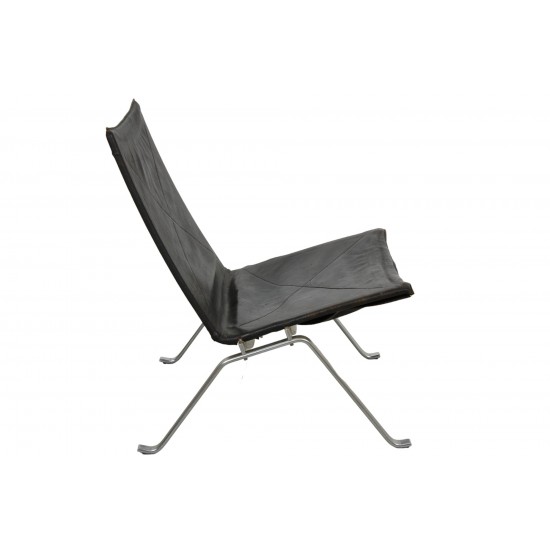 Poul Kjærholm PK-22 lounge chair in patinated black leather