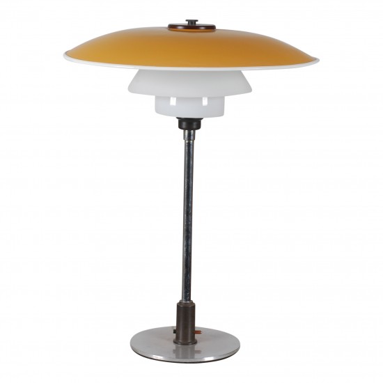 Poul Henningsen PH 4,5/4 table lamp with a nickel-plated brass frame